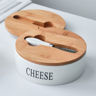 Caja para mantequilla y queso de cerámica con cuchillo.